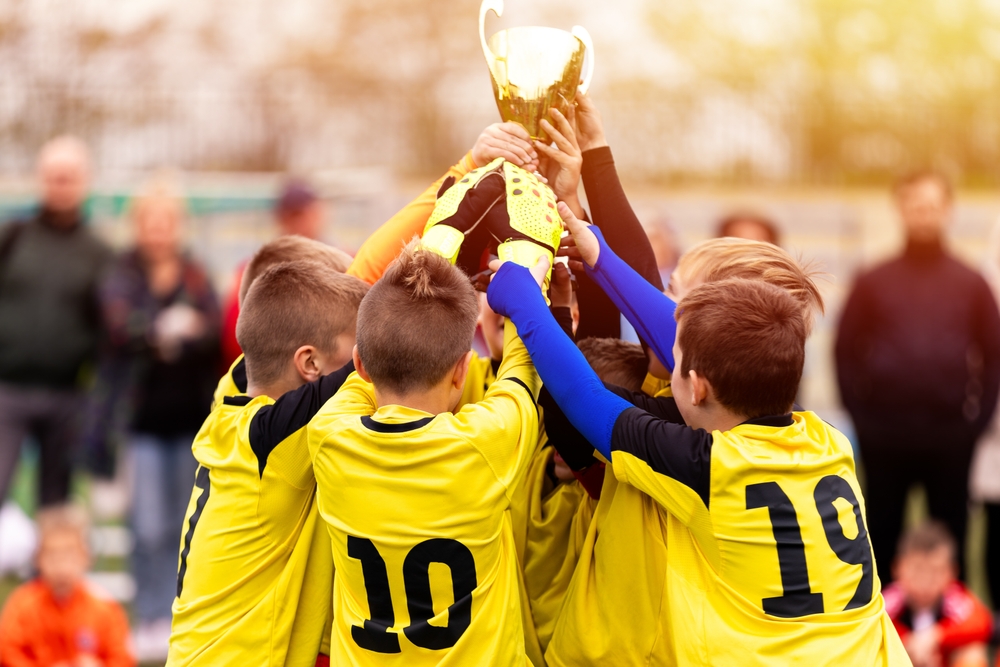 Group of children with a trophy